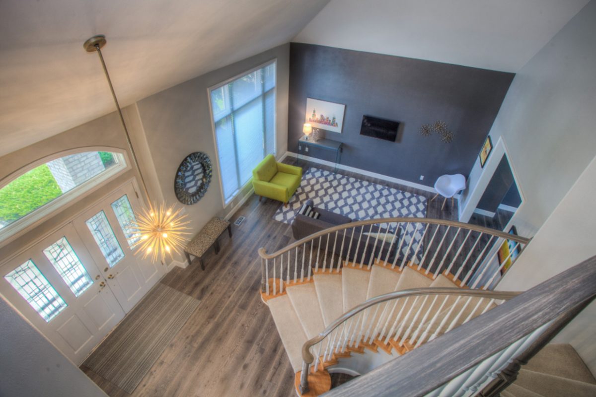 The inside of a home looking down a staircase